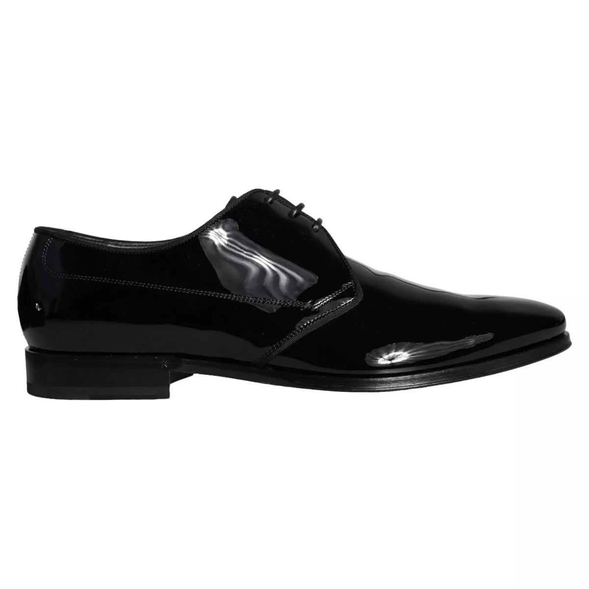 Black calfskin leather Derby men's dress shoes by Dolce & Gabbana, featuring sleek design and polished finish.