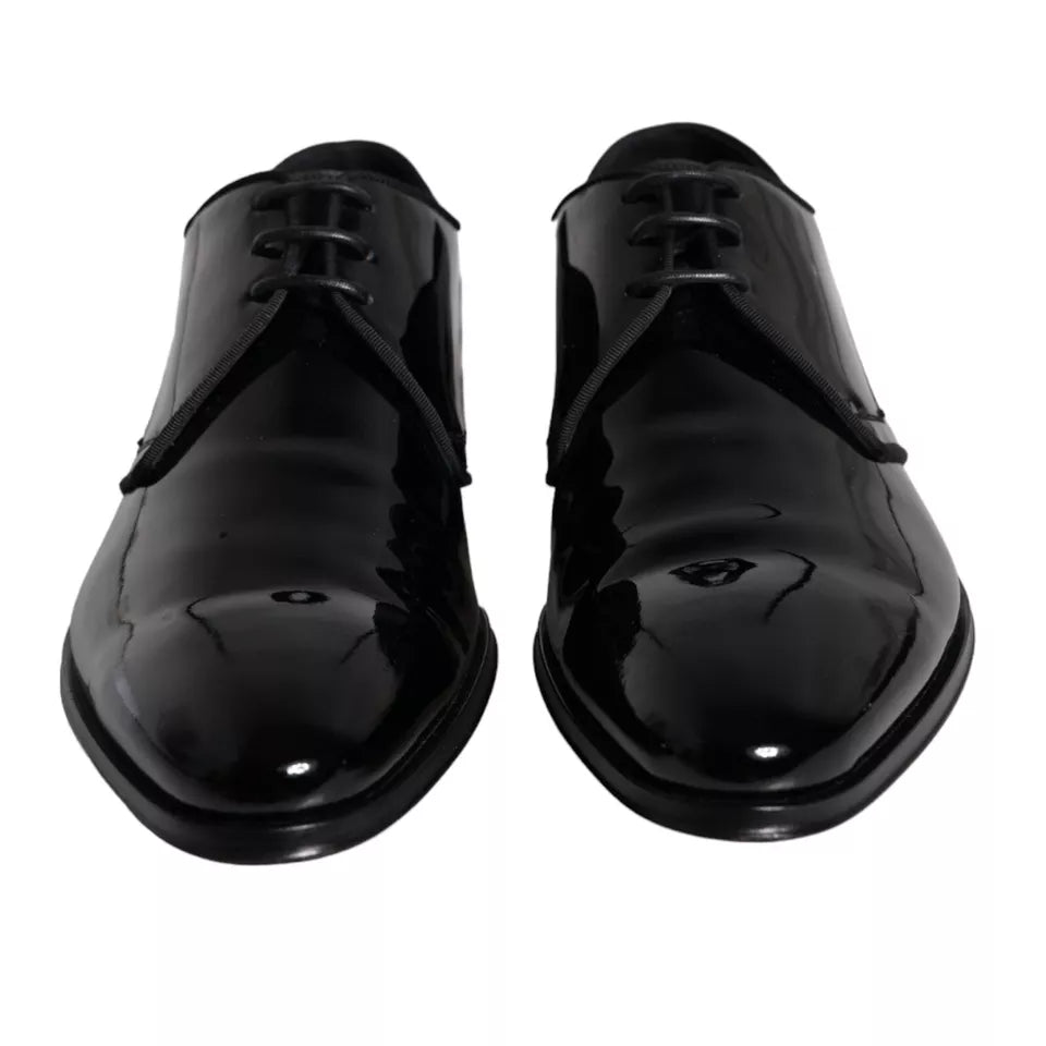 Black calfskin leather Derby men's dress shoes by Dolce & Gabbana, showing polished finish and classic design.