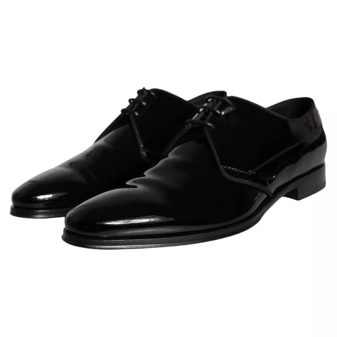 Black calfskin leather Derby men's dress shoes by Dolce & Gabbana, featuring sleek design and polished finish.