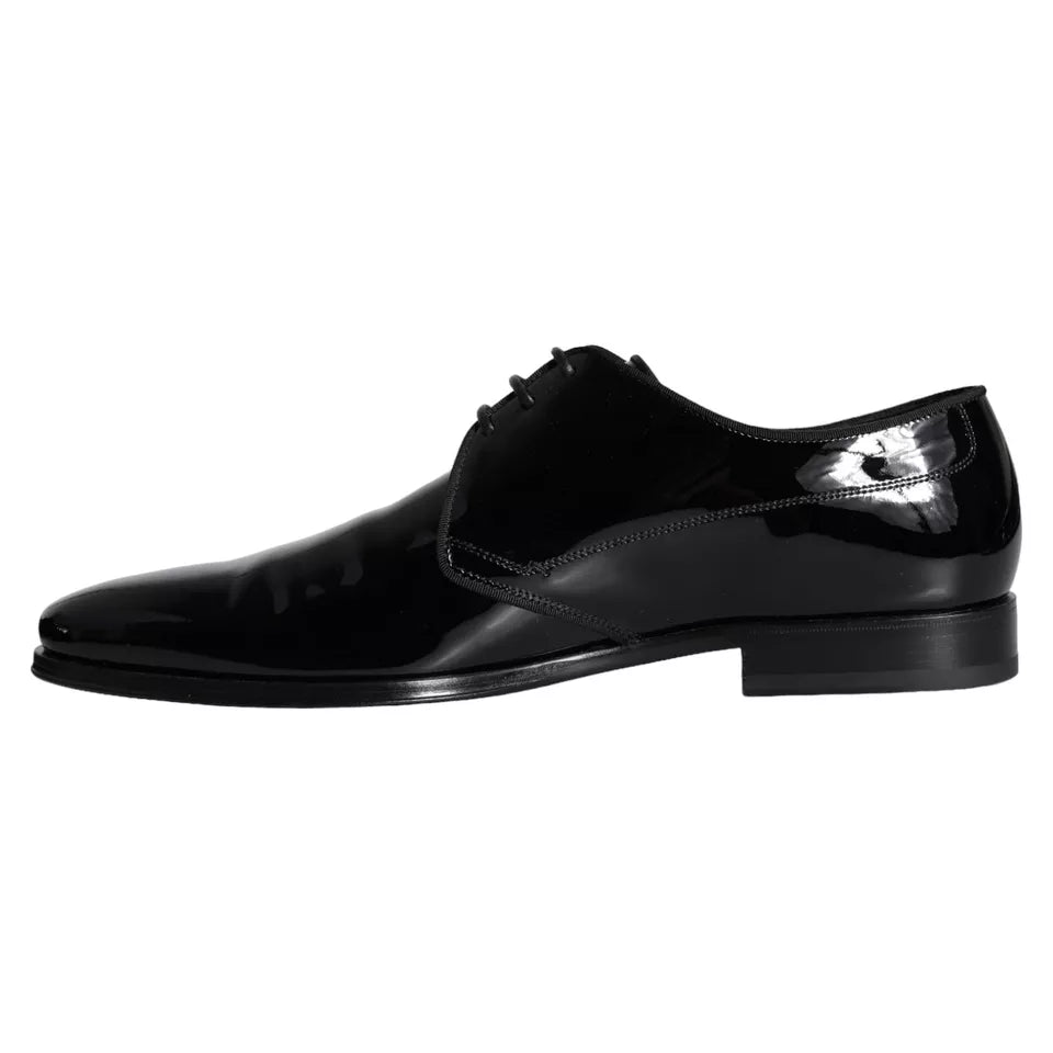 Black calfskin leather Derby men's dress shoes by Dolce & Gabbana with sleek design and polished finish.