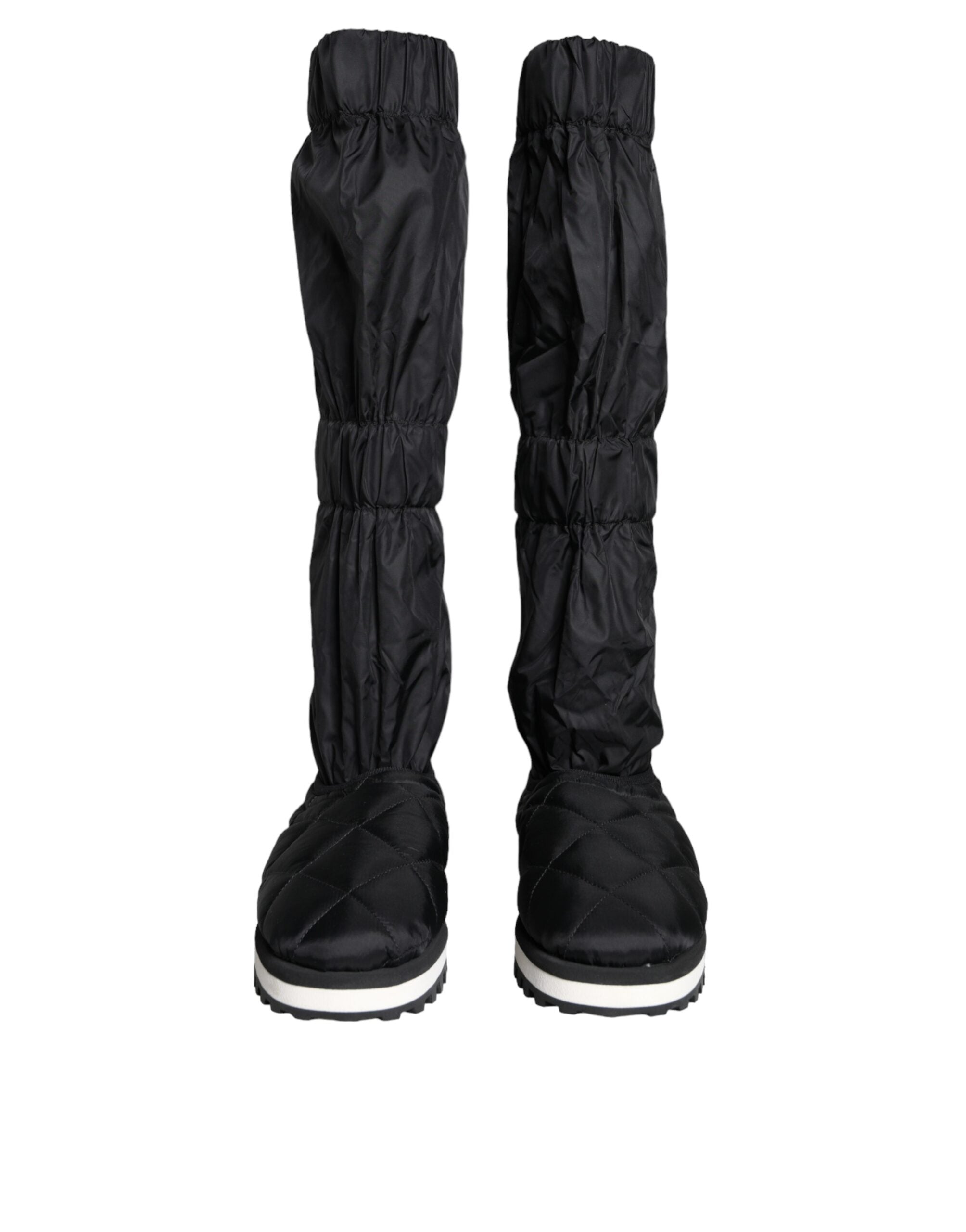 Black quilted high top sneakers by Dolce & Gabbana, featuring a stylish design and lace-up closure.