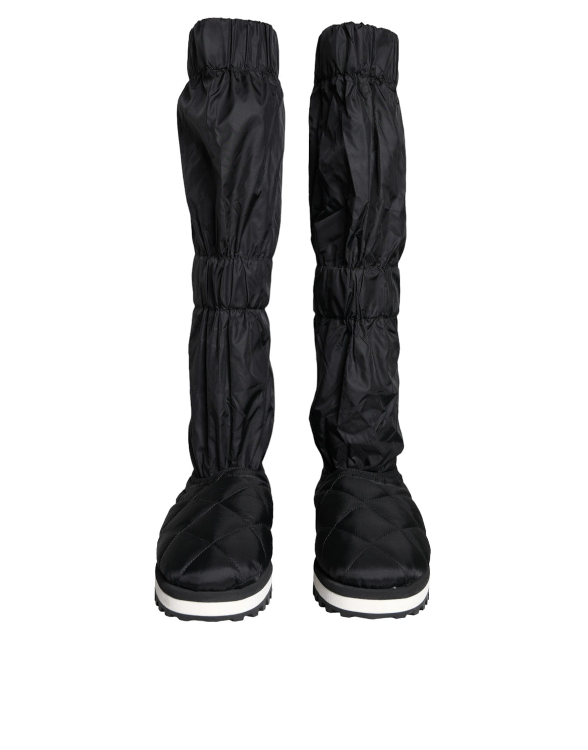 Black quilted high top sneakers by Dolce & Gabbana, featuring a stylish design and lace-up closure.