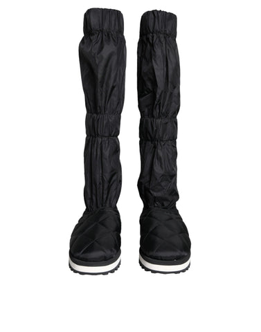 Black quilted high top sneakers by Dolce & Gabbana, featuring a stylish design and lace-up closure.
