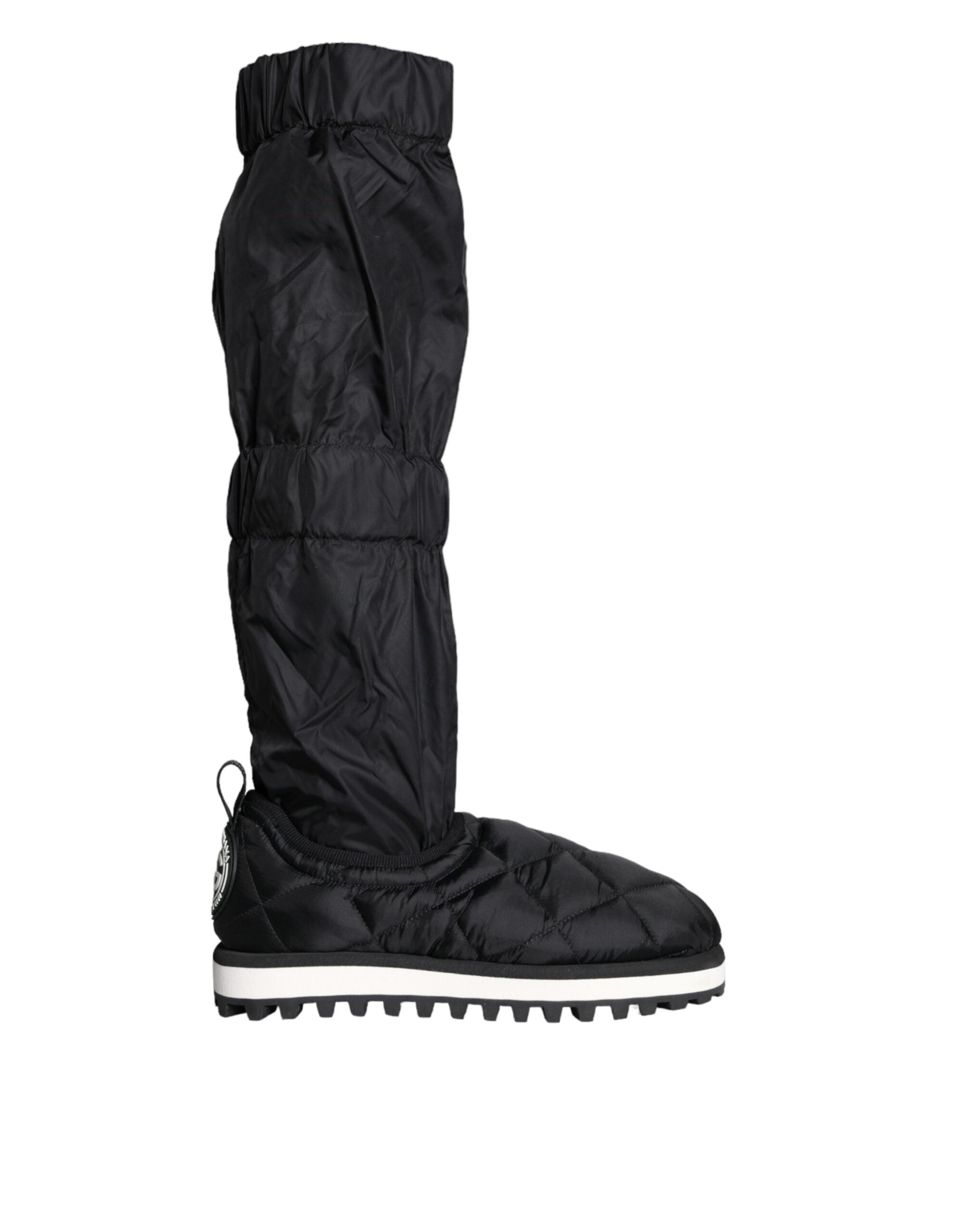 Black quilted high-top sneakers by Dolce & Gabbana, featuring a stylish design and textured quilted pattern.