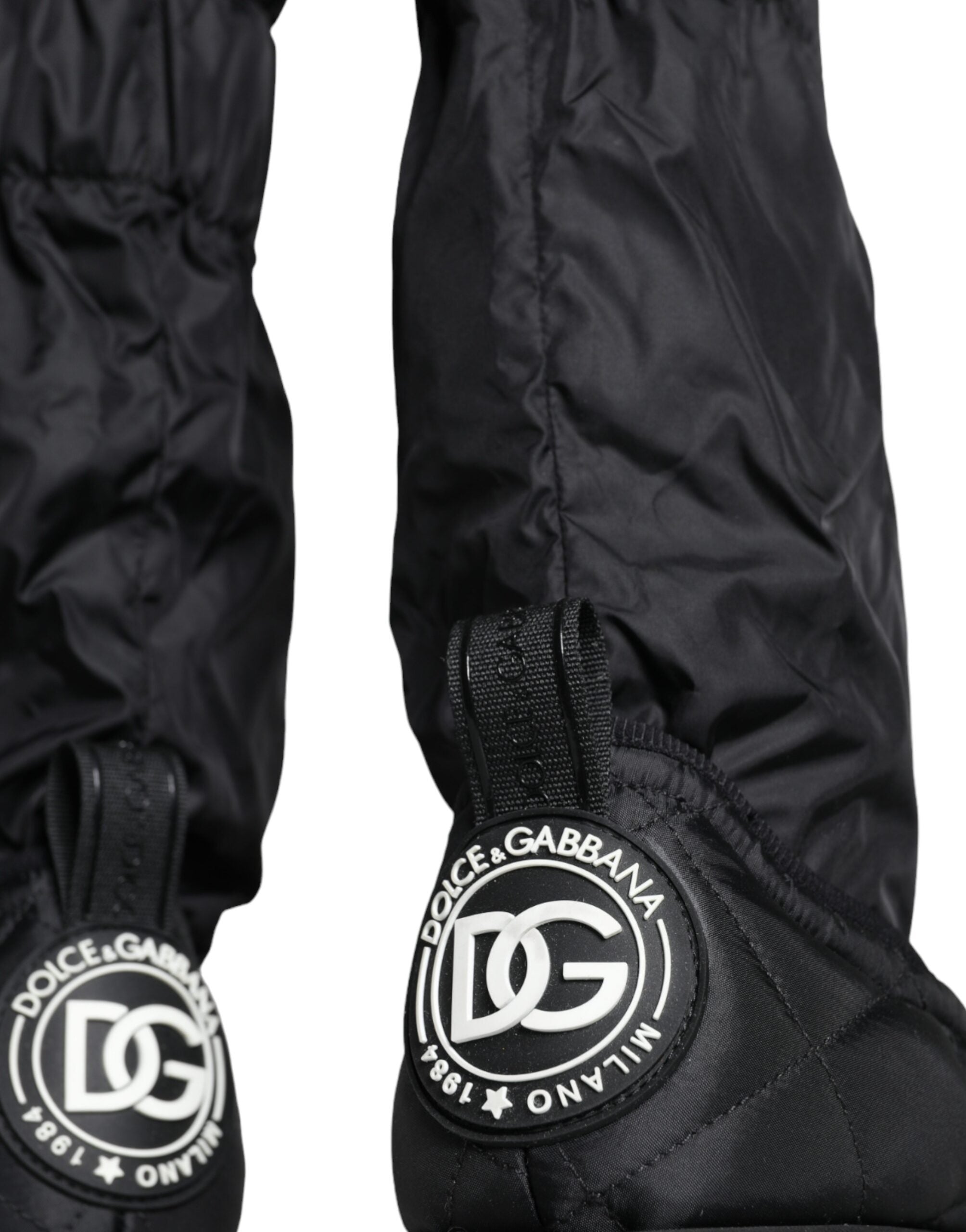 Black quilted high-top sneakers from Dolce & Gabbana with a stylish, textured design and lace-up closure.