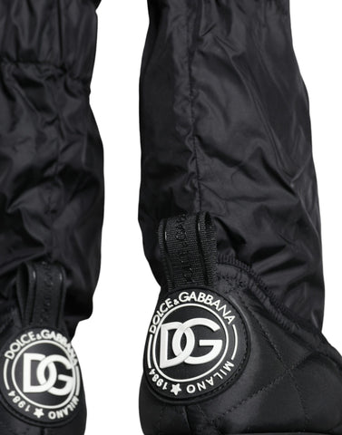 Black quilted high-top sneakers from Dolce & Gabbana with a stylish, textured design and lace-up closure.