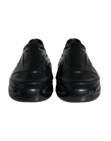 Black foiled rubber low-top men's sneakers by Dolce & Gabbana with sleek design and fashionable style.