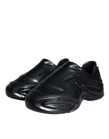 Black foiled rubber low-top men's sneakers by Dolce & Gabbana with sleek design and rubber soles.