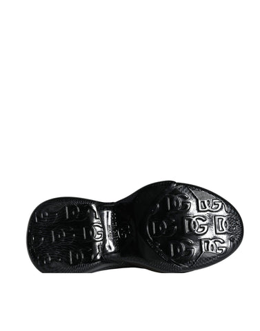 Black foiled rubber low-top men's sneakers by Dolce & Gabbana with sleek design and rubber outsole, stylish and comfortable footwear.