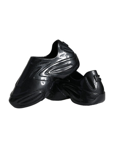 Black foiled rubber low top men's sneakers by Dolce & Gabbana with sleek design and textured rubber soles.