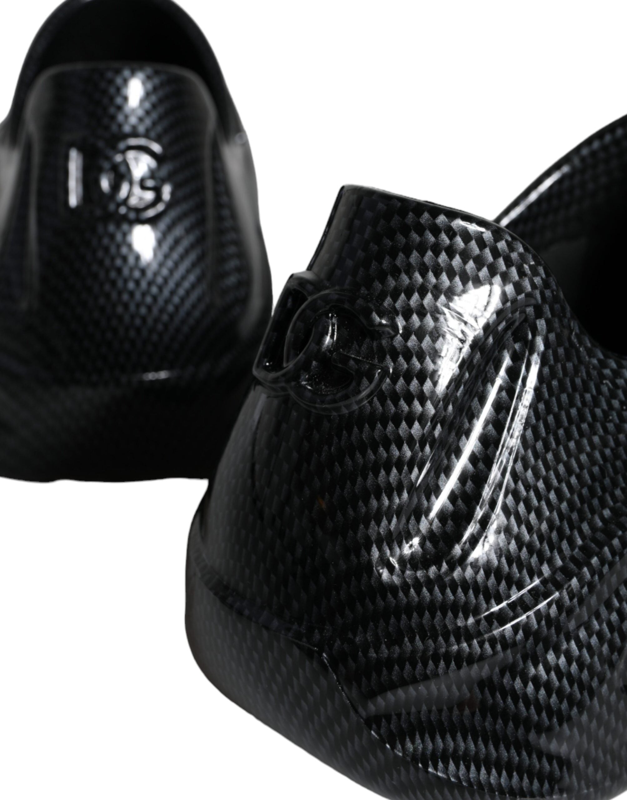 Black foiled rubber low-top men's sneakers by Dolce & Gabbana featuring sleek design and rubber soles.