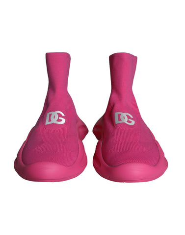Pink slip-on sneakers with logo print by Dolce & Gabbana, featuring a casual sneaker design and comfortable fabric.