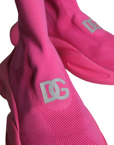 Pink slip-on sneakers with logo print from Dolce & Gabbana featuring a stylish, casual design and comfortable fit.