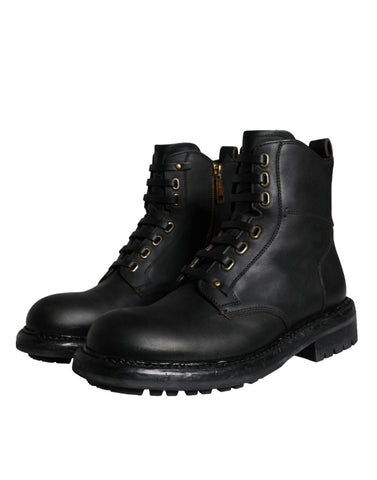 Black lace-up mid-calf boots for men by Dolce & Gabbana, featuring stylish design and durable leather material.