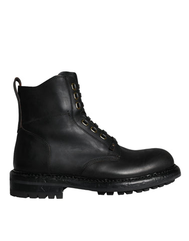 Black lace-up mid-calf men's boots by Dolce & Gabbana, featuring stylish design and durable leather material.