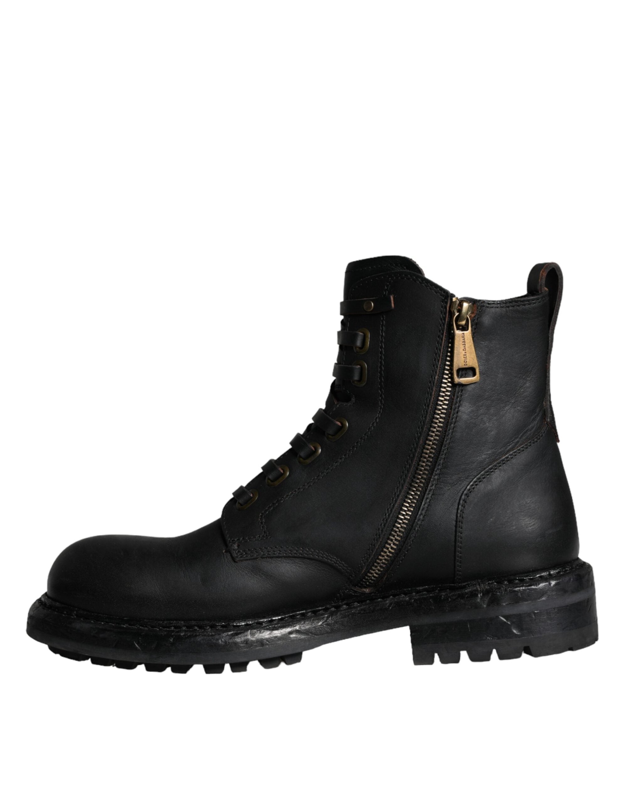Black lace-up mid-calf men's boots by Dolce & Gabbana, featuring leather construction and stylish design.