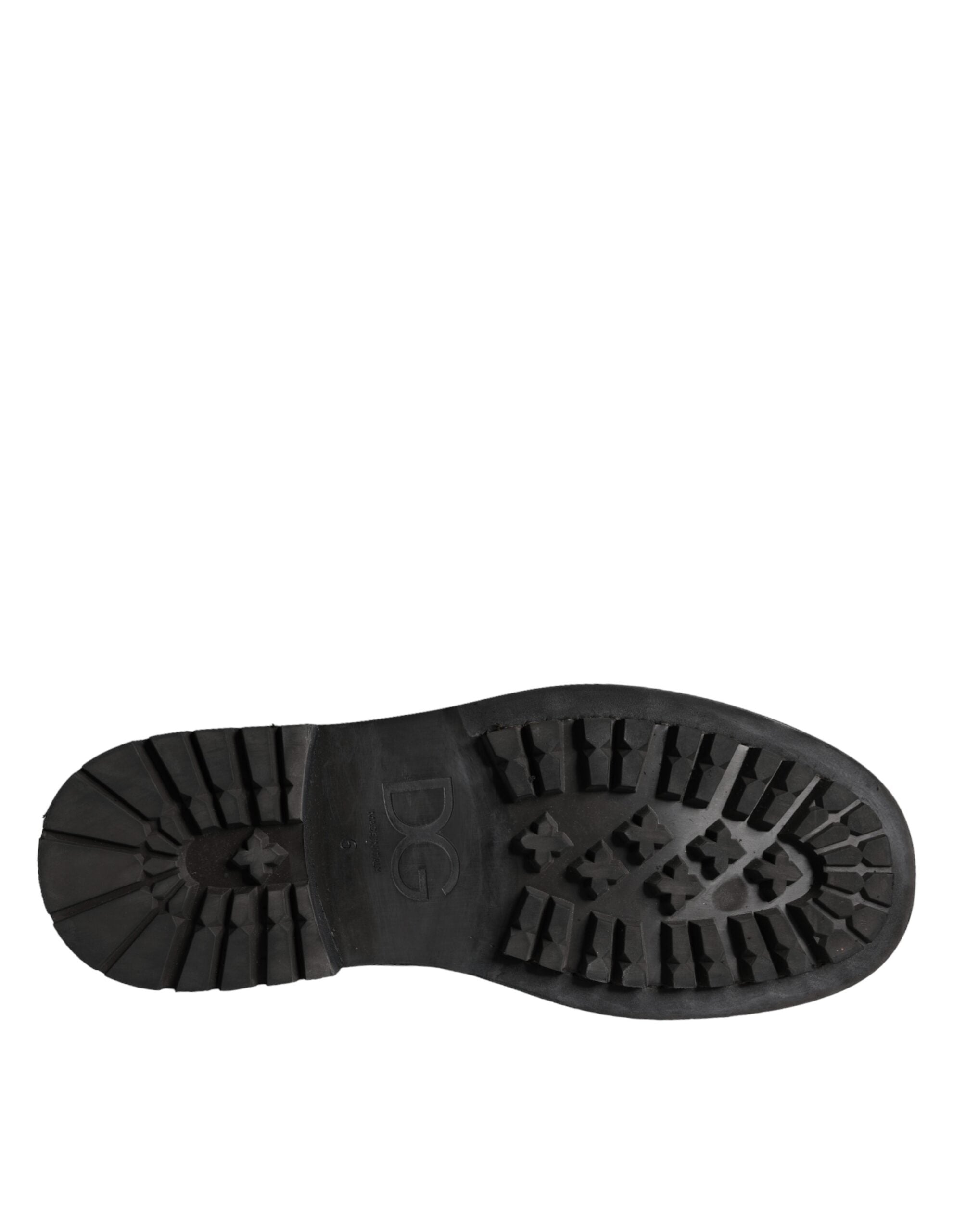 Black lace-up mid-calf boots for men by Dolce & Gabbana, featuring stylish design and sturdy sole.