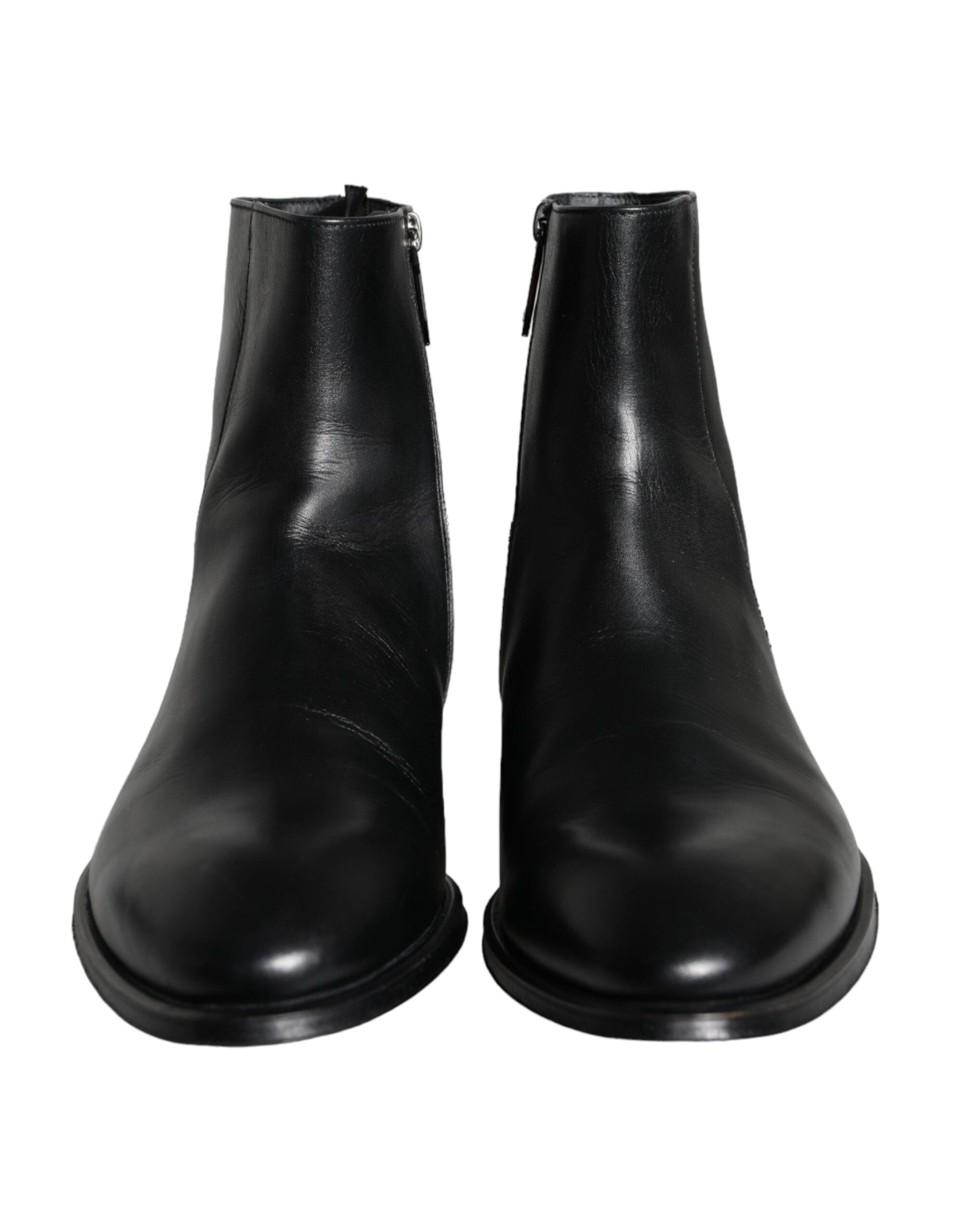 Black calf leather men's ankle boots by Dolce & Gabbana, featuring sleek design and sturdy sole.