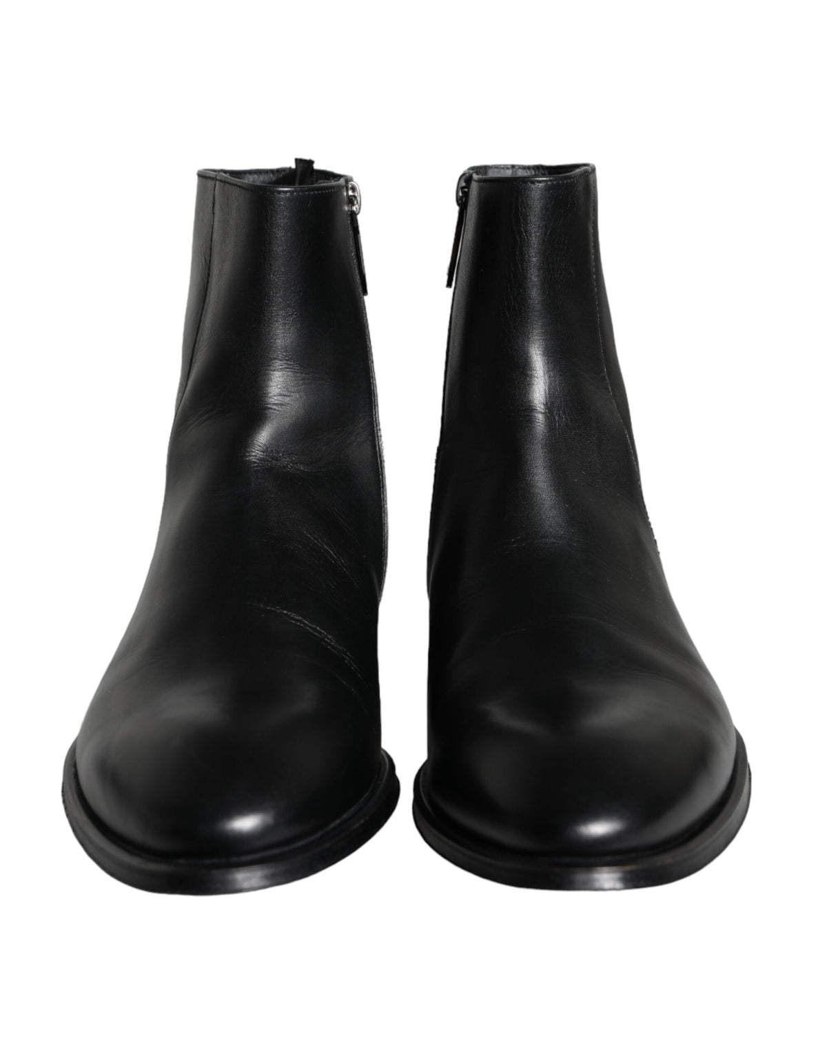 Black calf leather men's ankle boots by Dolce & Gabbana, featuring sleek design and sturdy sole.