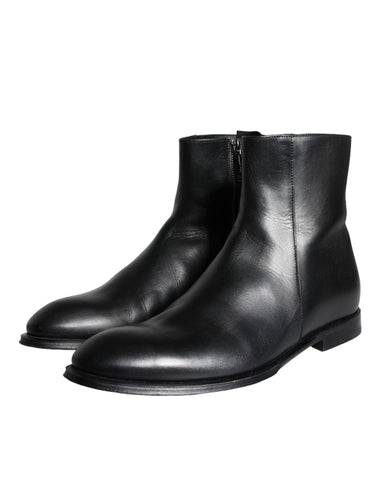 Black calf leather men's ankle boots by Dolce & Gabbana, stylish men's shoes with sleek design and ankle height.