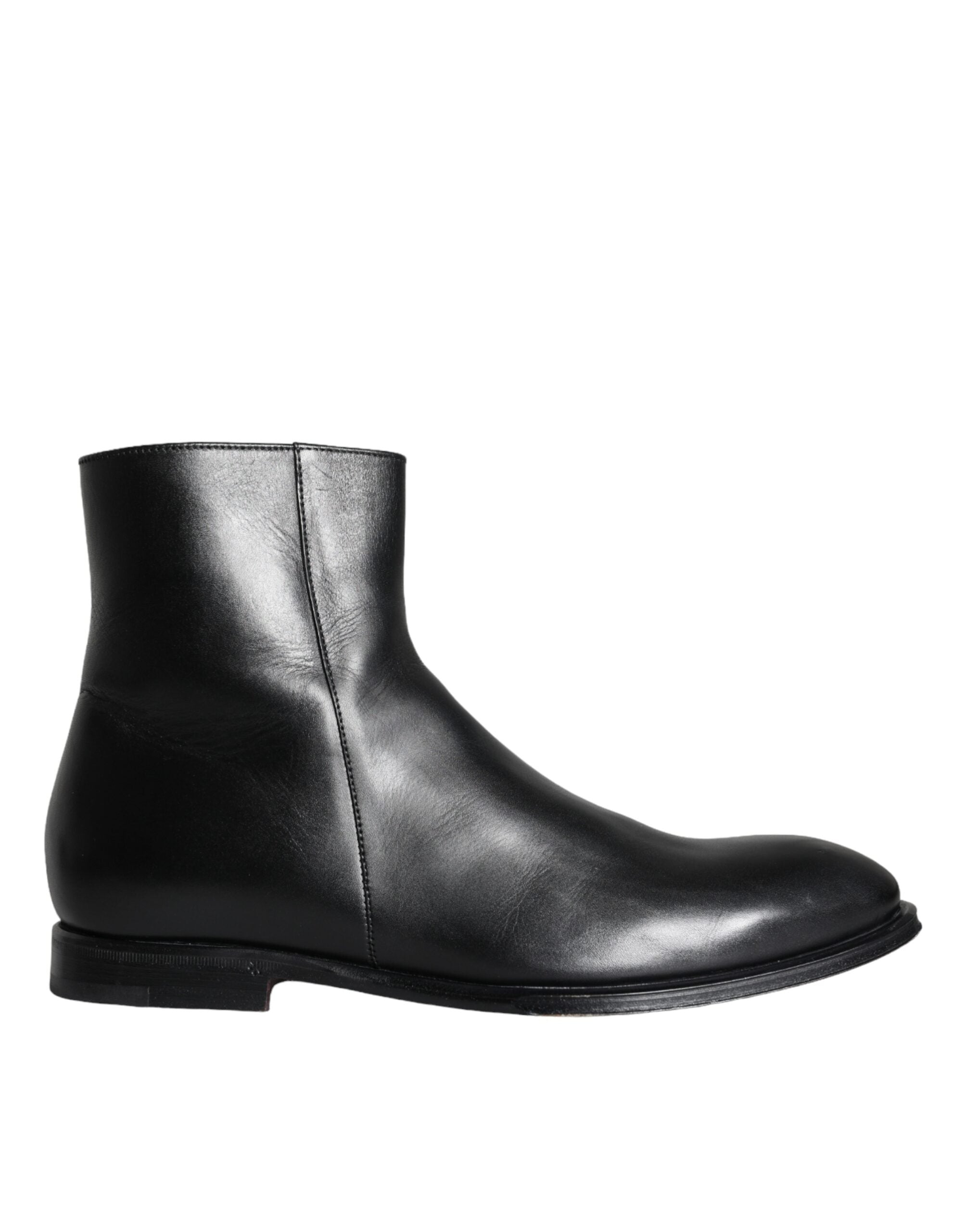 Black calf leather men's ankle boots by Dolce & Gabbana, featuring sleek design and stylish ankle-high silhouette.
