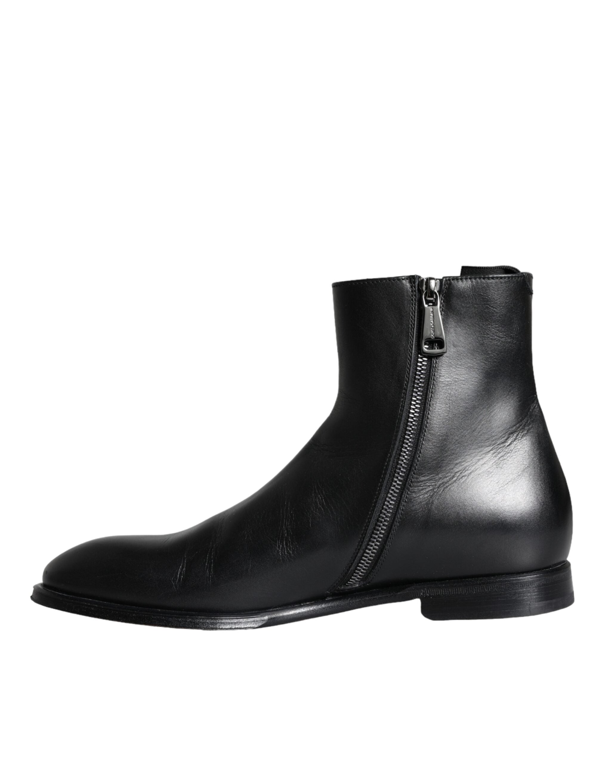 Black calf leather men's ankle boots by Dolce & Gabbana, featuring sleek design and stylish ankle-height silhouette.