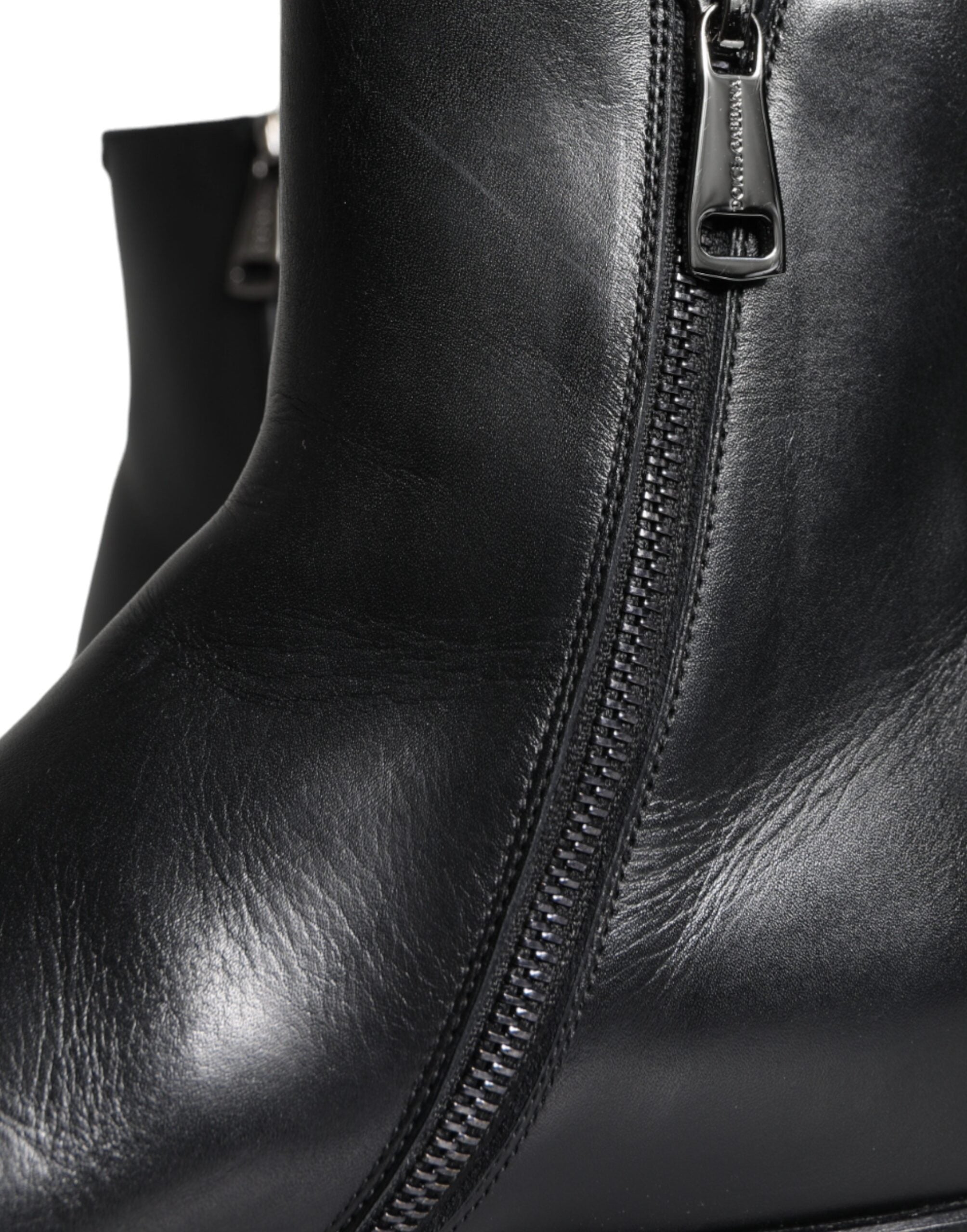 Black calf leather men's ankle boots by Dolce & Gabbana, featuring sleek design and durable leather construction.