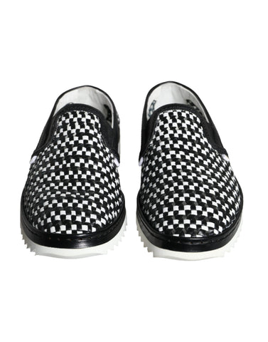 Dolce & Gabbana black and white woven slip-on men's loafers shoes displayed on a white background.