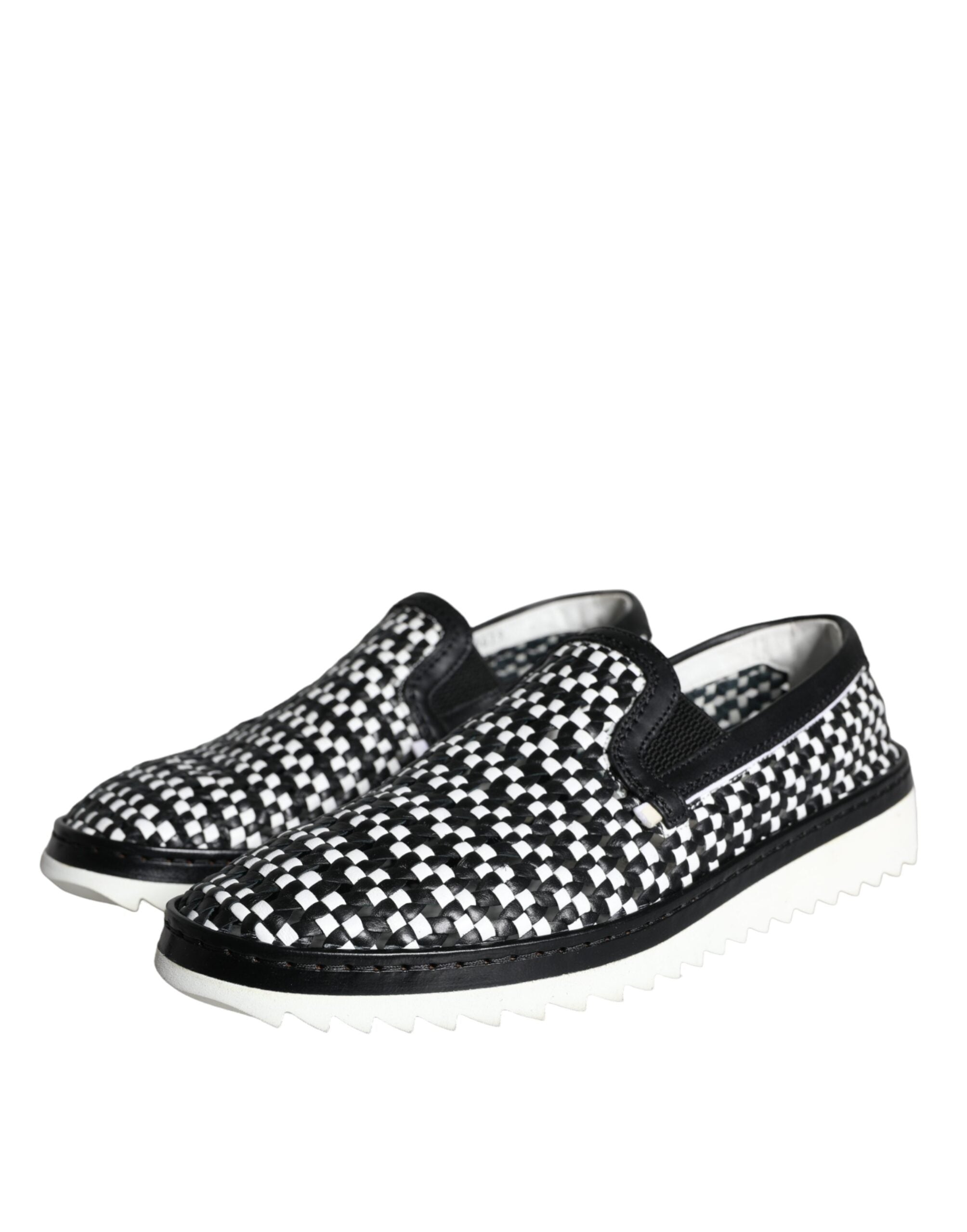 Black and white woven slip-on men's loafers by Dolce & Gabbana, featuring a sleek design and comfortable fit.