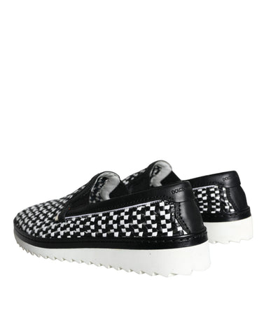 Black and white woven slip-on men's loafers by Dolce & Gabbana, featuring a stylish and comfortable design.