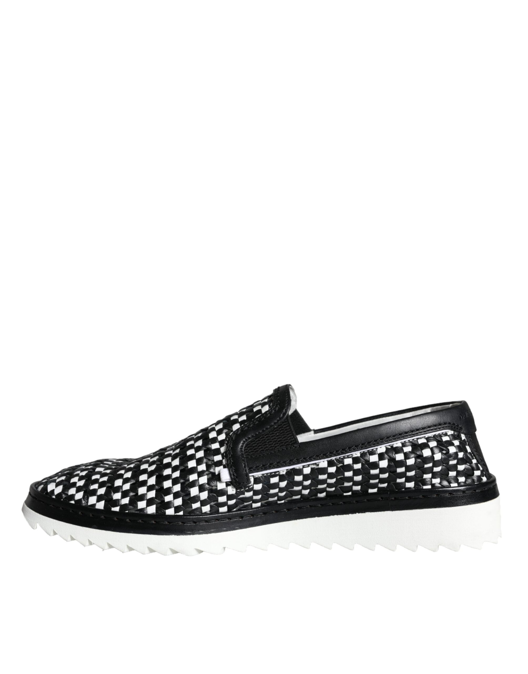 Black and white woven slip-on men's loafers by Dolce & Gabbana, featuring a stylish and comfortable design.