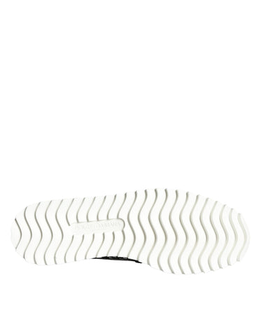 Black and white woven slip-on men's loafers by Dolce & Gabbana, featuring a stylish and comfortable design.