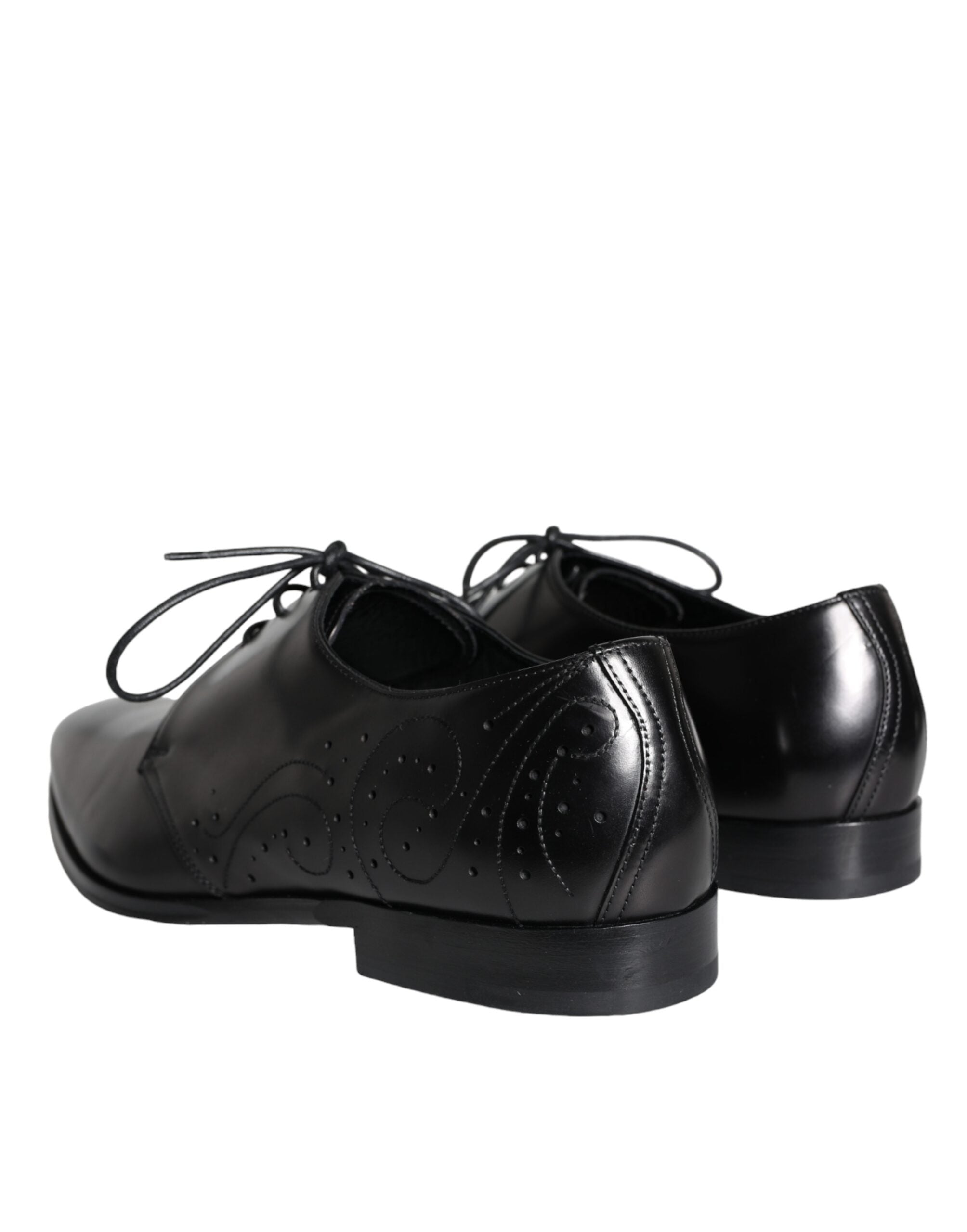 Black calfskin leather Derby men's dress shoes by Dolce & Gabbana, featuring sleek design and polished finish.