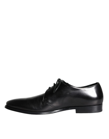 Black calfskin leather Derby men's dress shoes by Dolce & Gabbana with sleek design and polished finish.