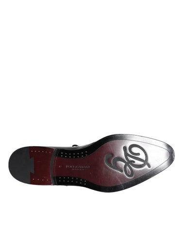 Black calfskin leather derby men's dress shoes by Dolce & Gabbana, featuring sleek design and polished finish.