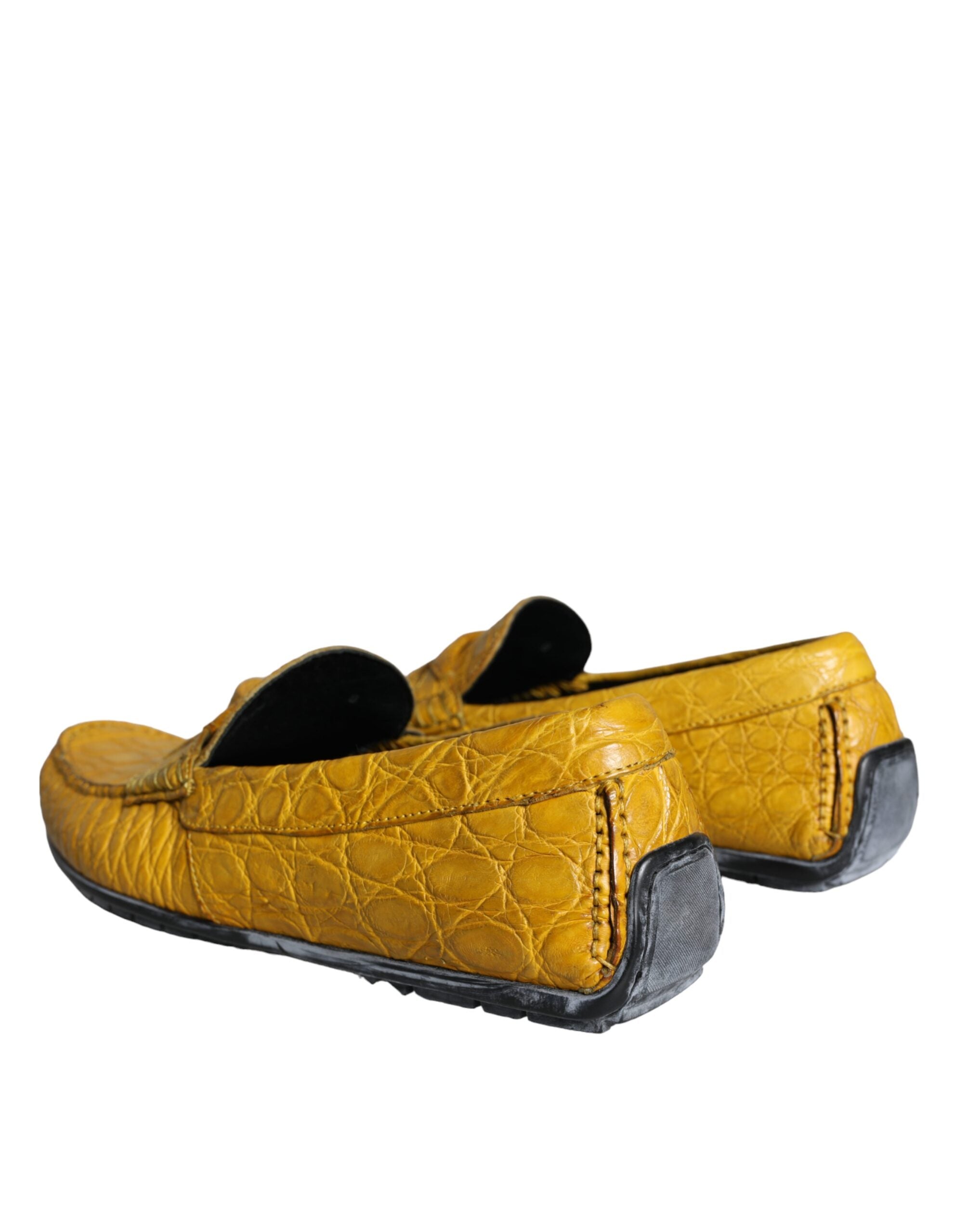 Yellow leather slip mocassin loafers shoes by Dolce & Gabbana with sleek design and classic slip-on style.