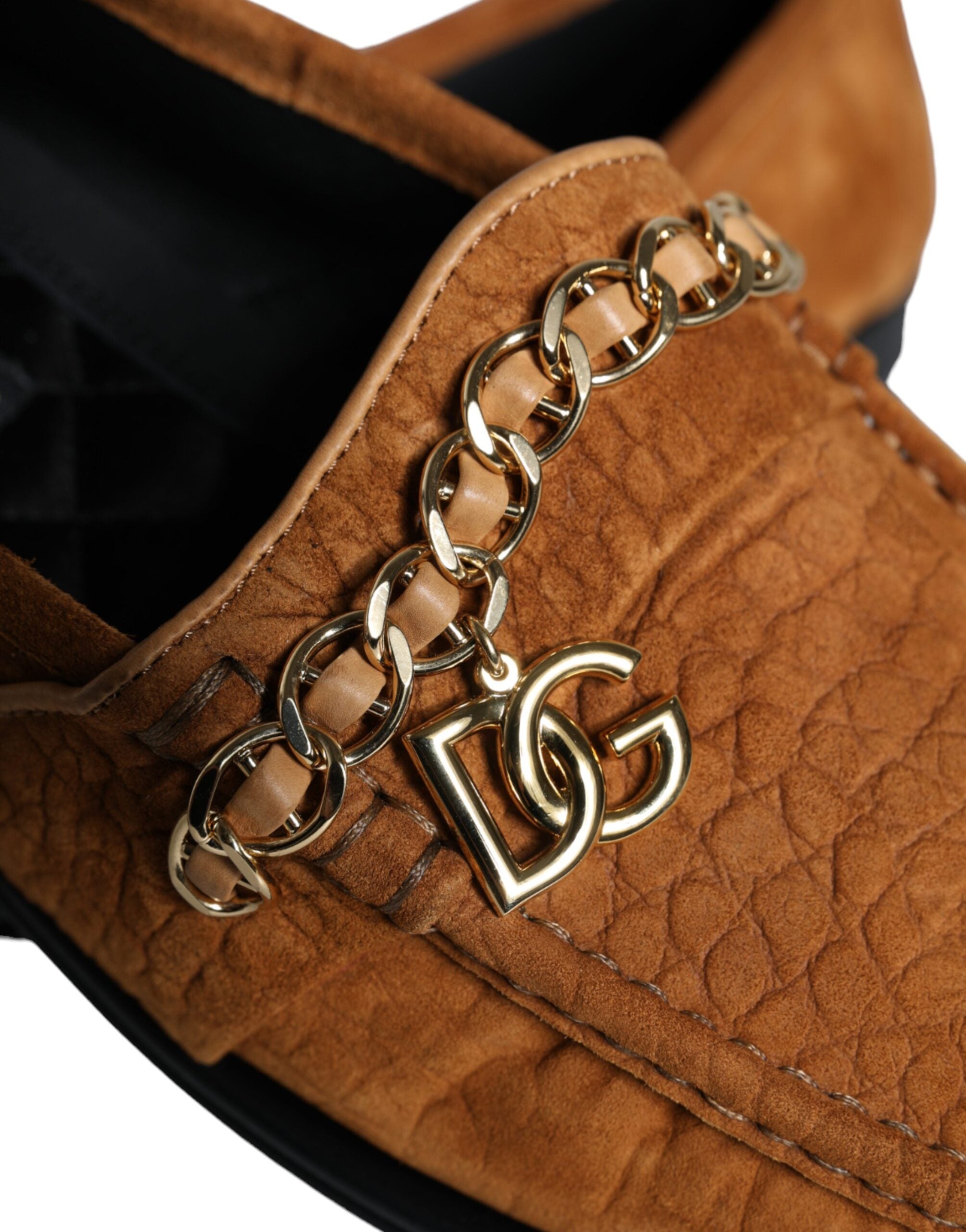 Brown velvet leather slip-on moccasin shoes with Dolce & Gabbana logo detail.