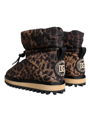 Brown leopard print ankle boots with padded soles by Dolce & Gabbana, featuring a stylish and comfortable design.
