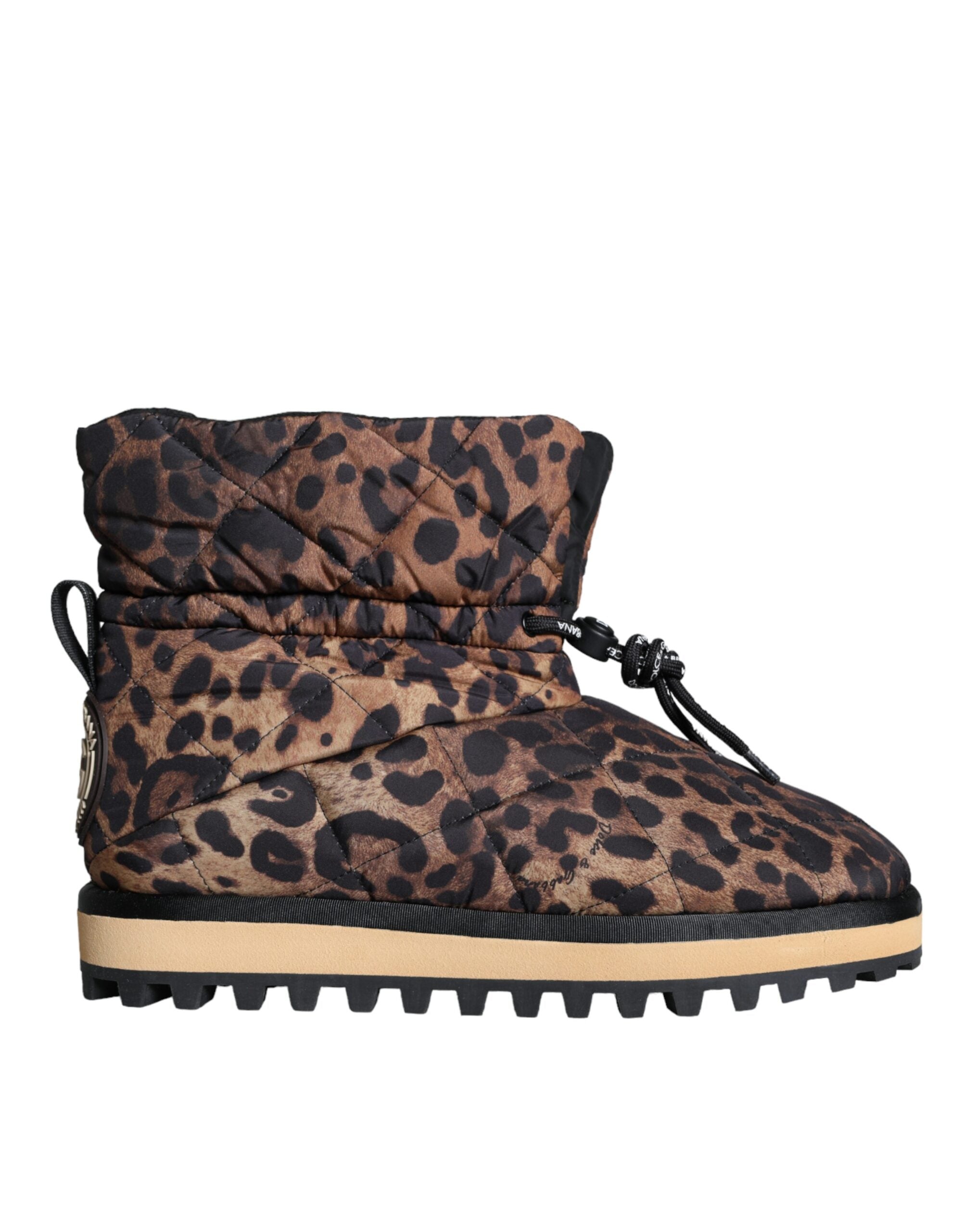 Brown leopard ankle boots with padded detail by Dolce & Gabbana, featuring a stylish animal print design.