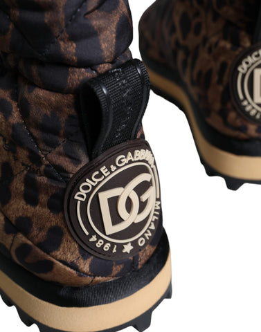 Brown leopard print ankle boots with padded shoes from Dolce & Gabbana, showcasing stylish footwear with a pointed toe and chunky heel.