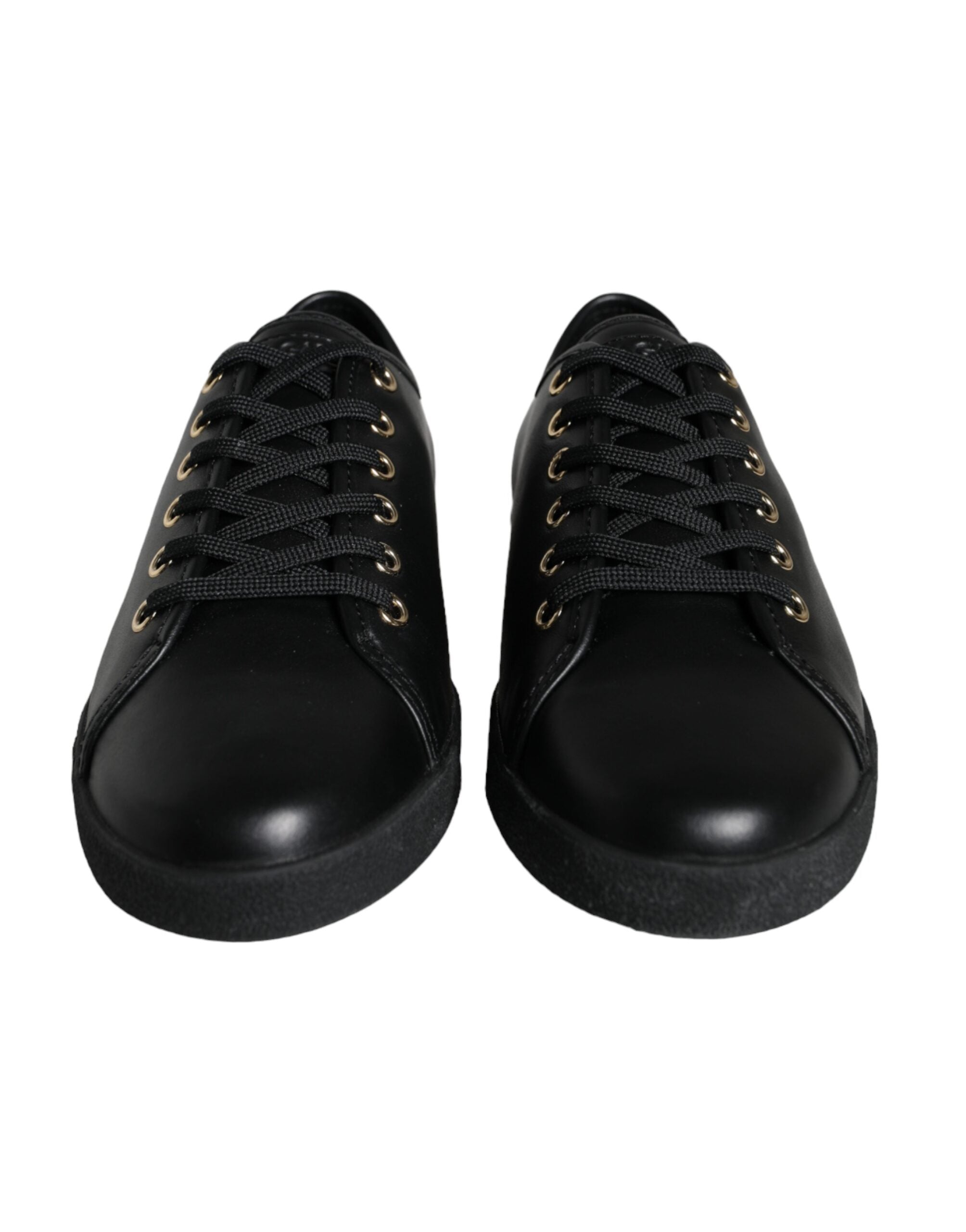 Black and gold leather Dolce & Gabbana classic sneakers with stylish design and white rubber soles.