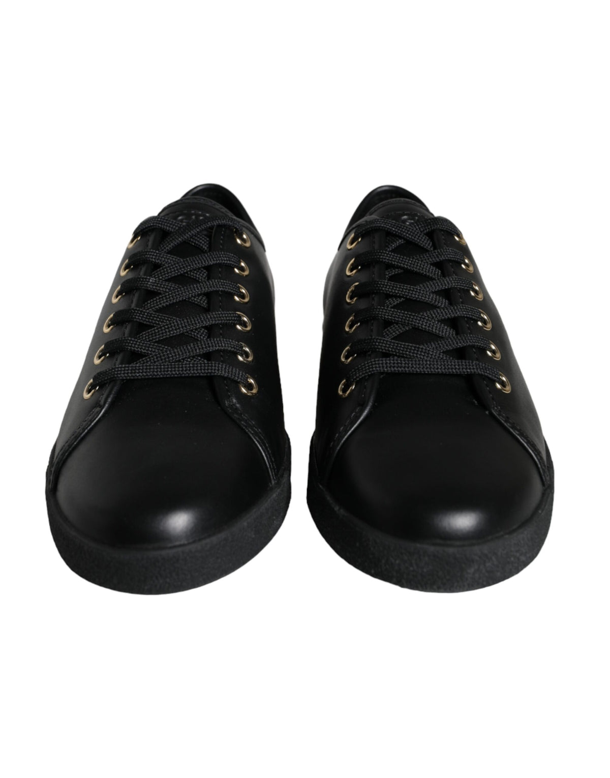 Black and gold leather Dolce & Gabbana classic sneakers with stylish design and white rubber soles.