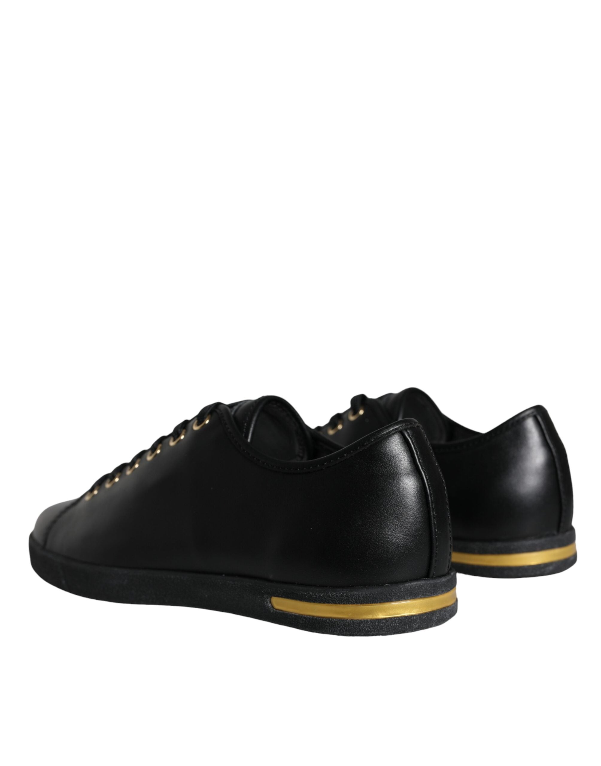 Black gold leather Dolce & Gabbana classic sneakers with sleek design and stylish laces, showcasing premium craftsmanship.