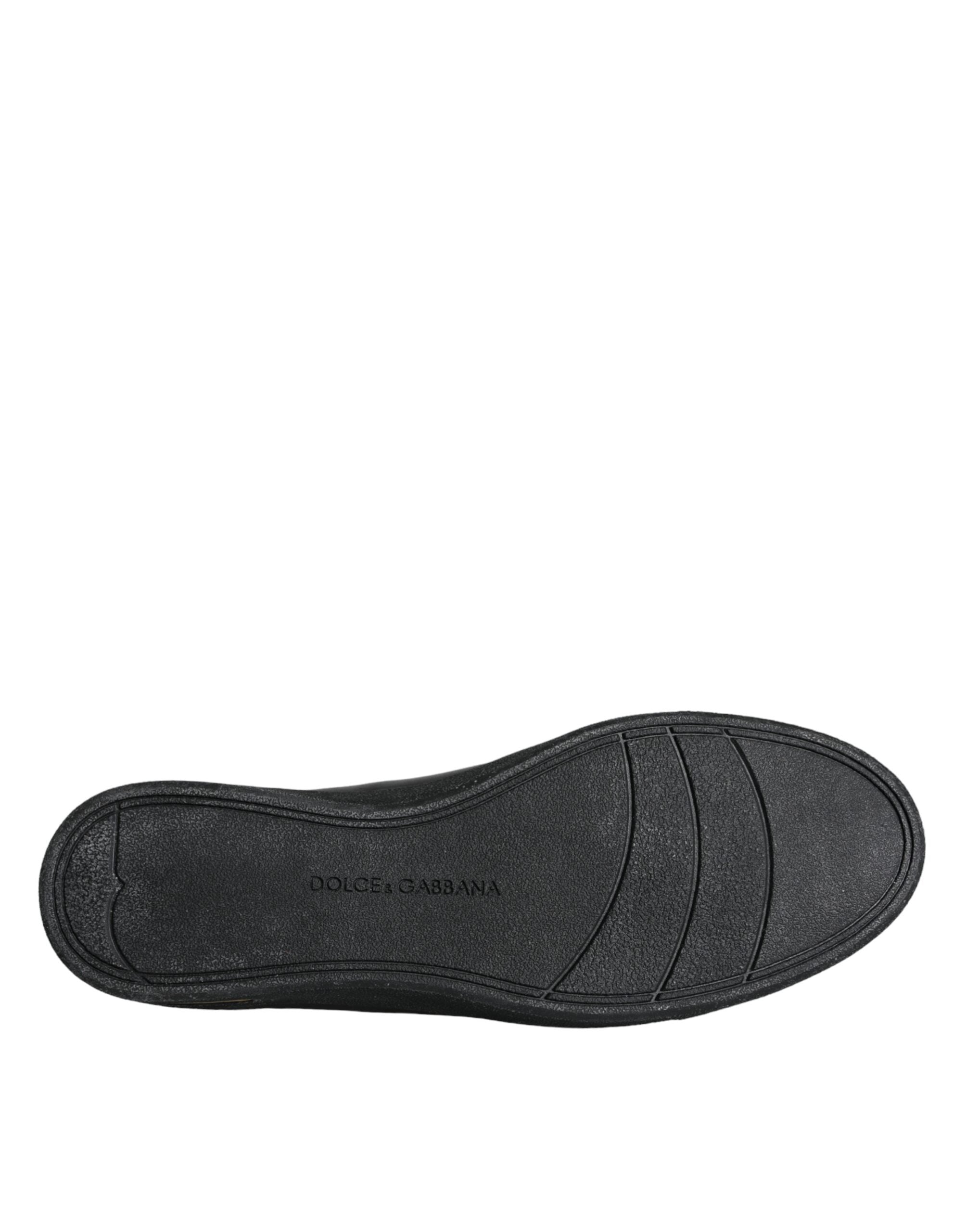 Black gold leather Dolce & Gabbana classic sneakers shoes with stylish design and white rubber sole.