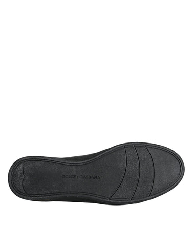 Black gold leather Dolce & Gabbana classic sneakers shoes with stylish design and white rubber sole.
