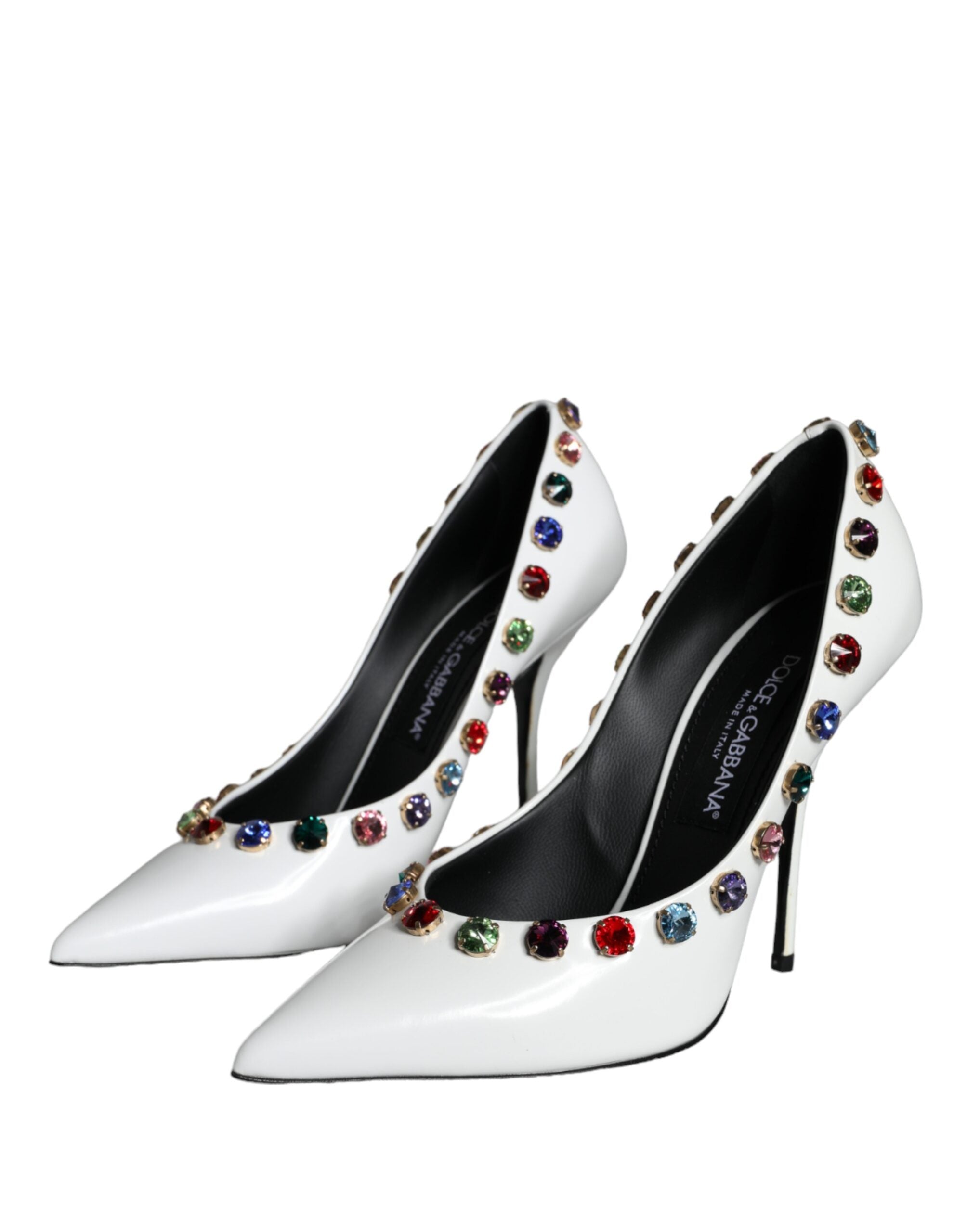 White crystal leather high heel pumps by Dolce & Gabbana, featuring sleek design and pointed toe, shown from side view.