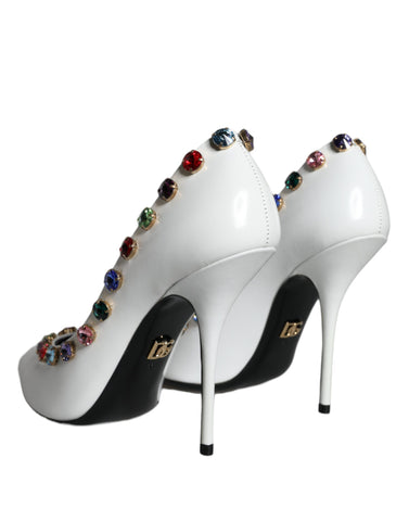 White crystal leather high heel pumps by Dolce & Gabbana, featuring elegant pointed toes and sleek design.