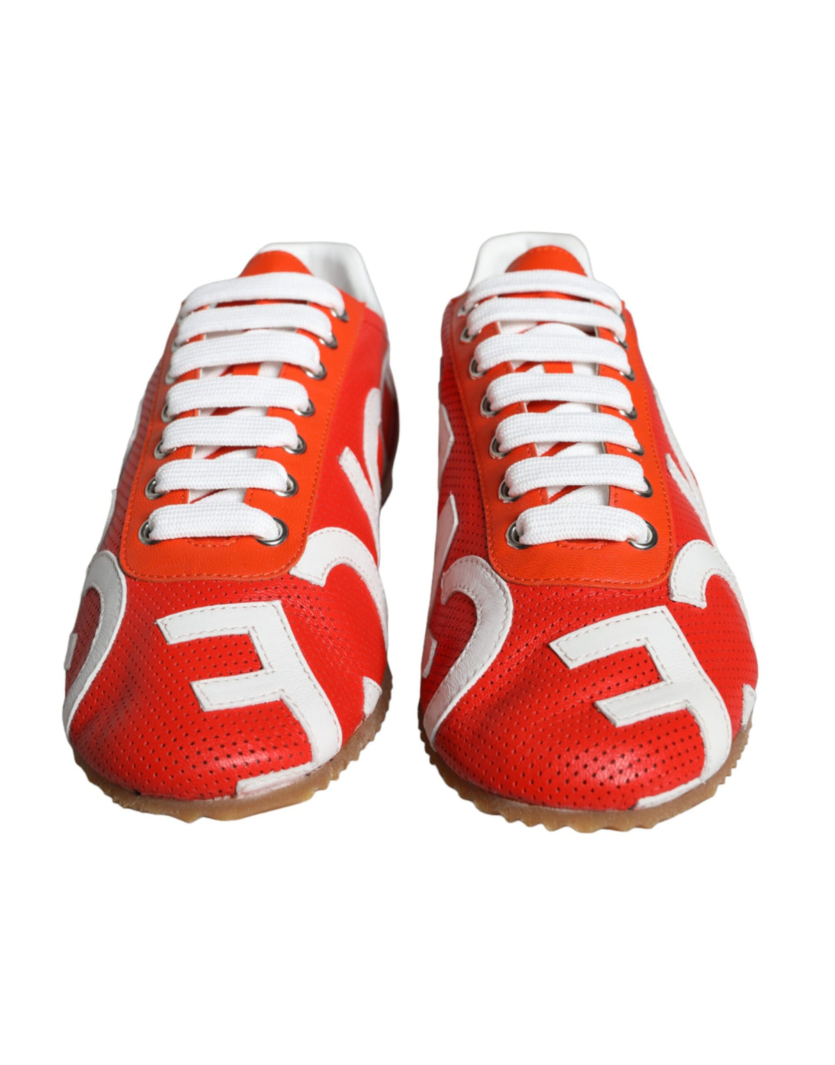 Red and white leather casual sneakers with Dolce & Gabbana logo, featuring stylish design and comfortable fit.