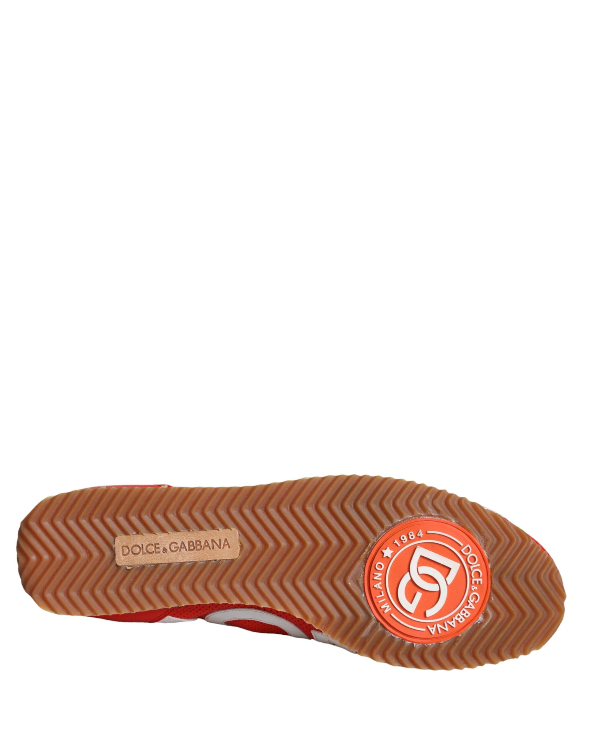 Red and white leather casual sneakers with Dolce & Gabbana logo, stylish and comfortable footwear for everyday wear.