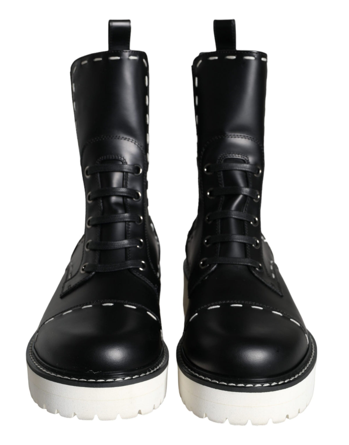 Black leather combat mid-calf boots by Dolce & Gabbana, featuring rugged design and sturdy sole for fashionable statement footwear.